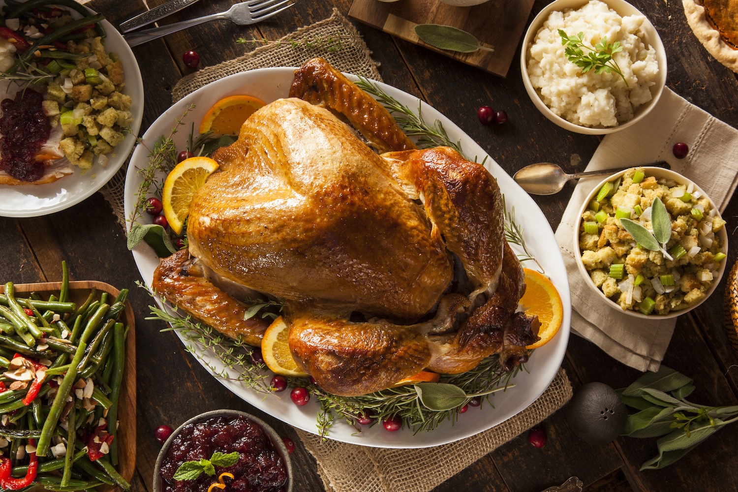 Thunder Bay Grille Thanksgiving Homemade Turkey with various sides around